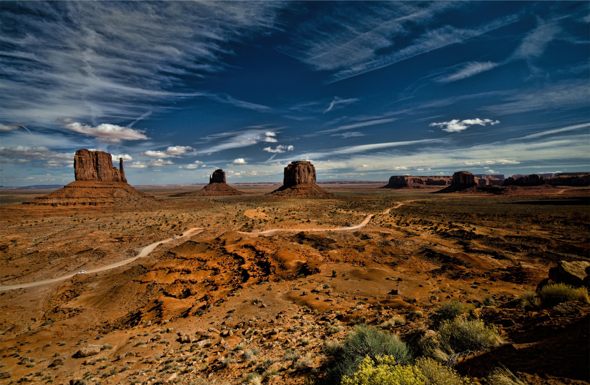 monument valley usa monument valley sky clouds landscape desert grass plant