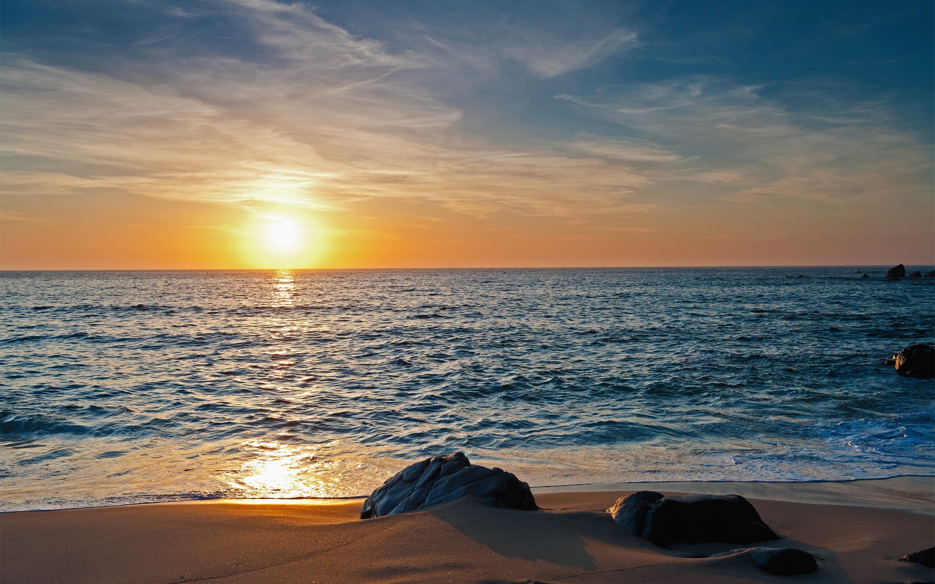 mer sable pierres nature coucher de soleil horizon