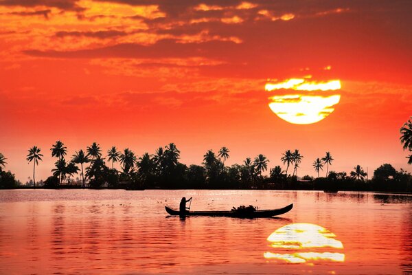 Boat in the river at a beautiful sunset