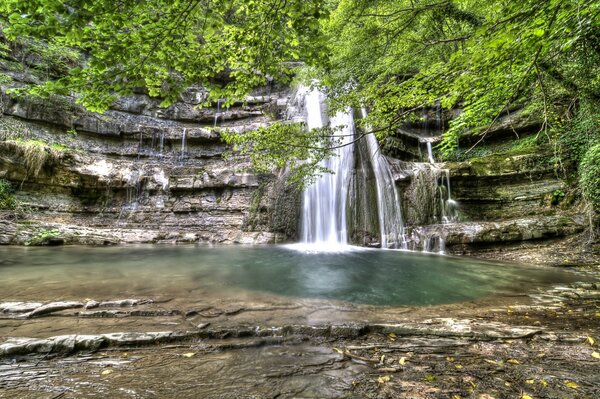 A small mountain waterfall. landscape