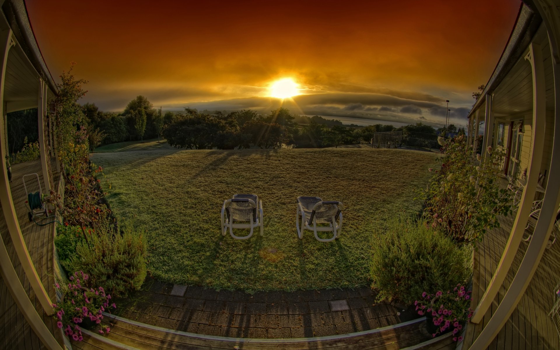 véranda coucher de soleil nuages