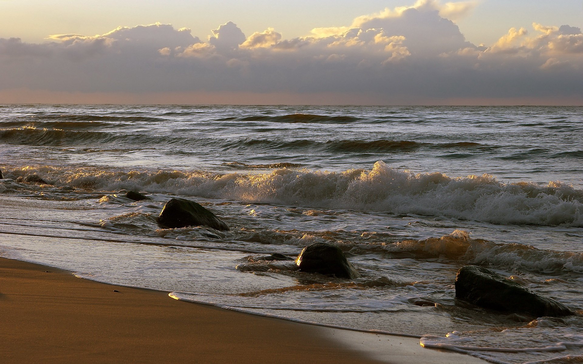 waves water spray surf sky sunset rocks horizon