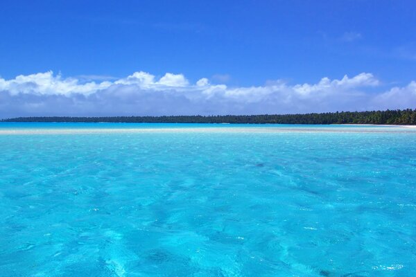 Relaxing on the blue sea beach