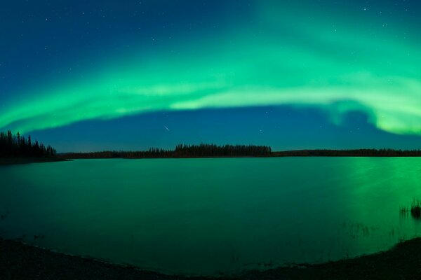 Mesmerizing northern lights by the river