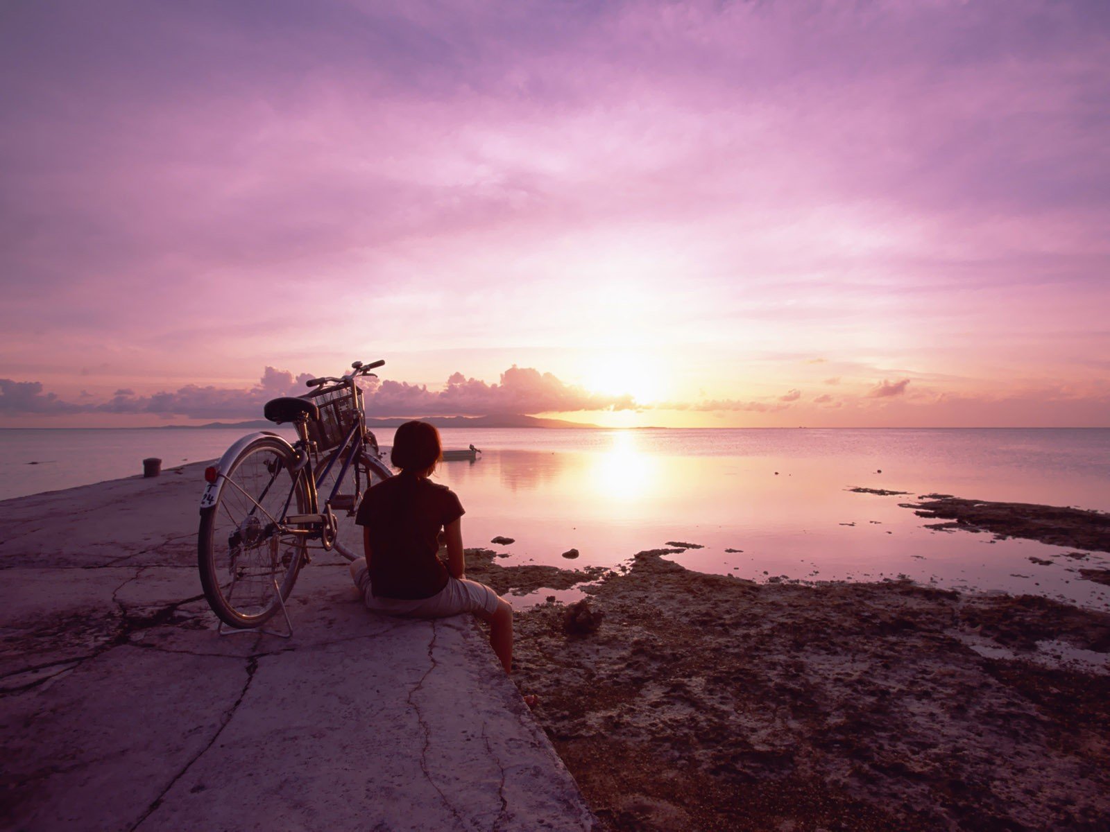 puesta de sol mar cielo bicicleta chica