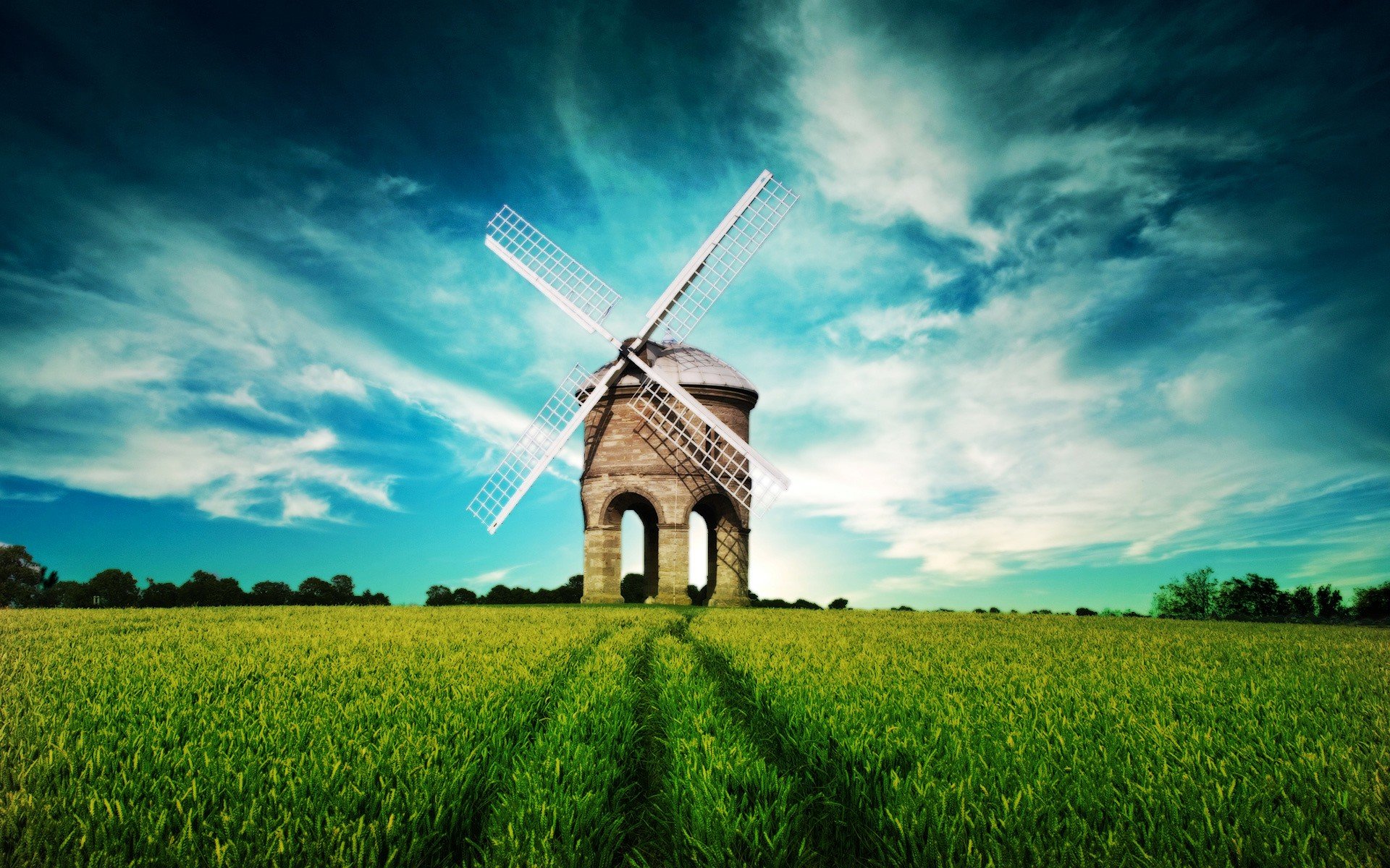 moulin à vent champ vert nuages