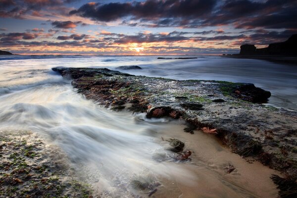 Seashore and colorful sunset