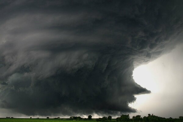 Dense hurricane over steppe and forest