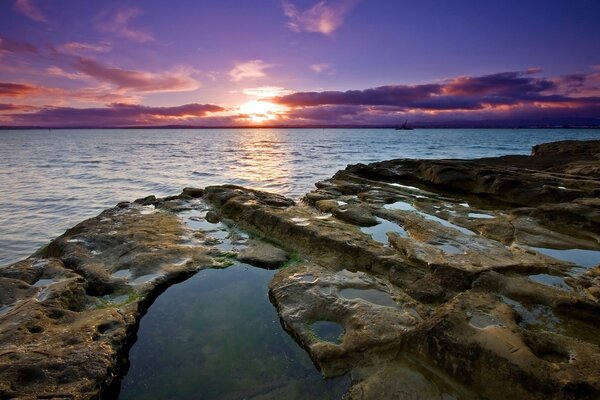 Sunset view from the rocky beach