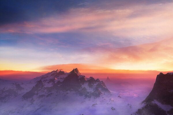 Snowy mountains in fiery clouds