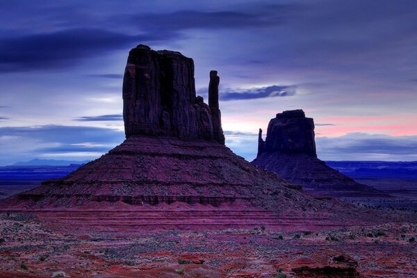 Pink mountains in the desert at dawn