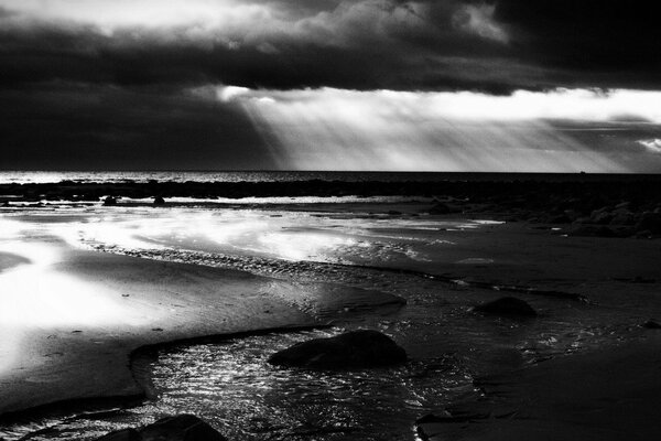 Black and white image. Calm sea