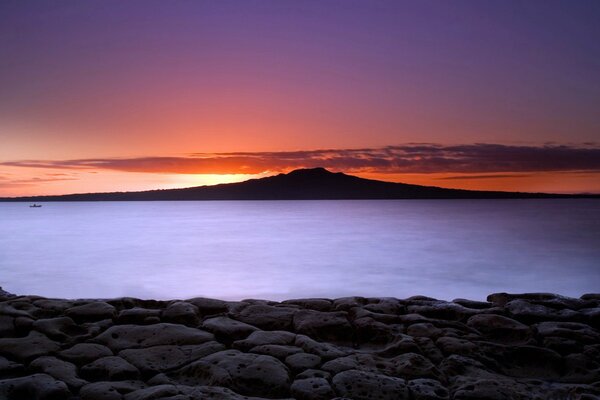 Rocky seashore at sunset