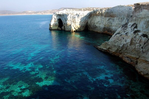 Grotto in a beautiful blue bay