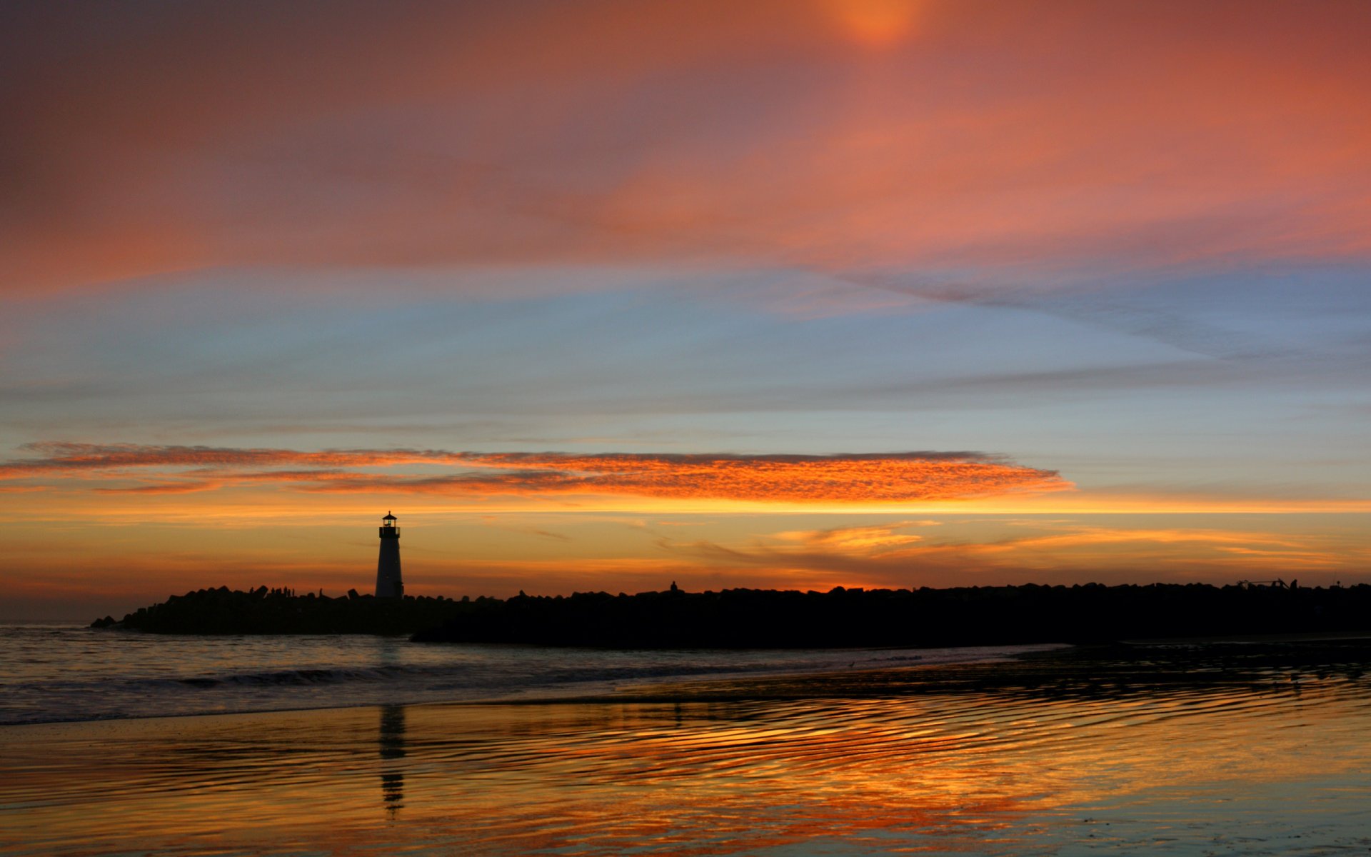 phare coucher de soleil réflexion