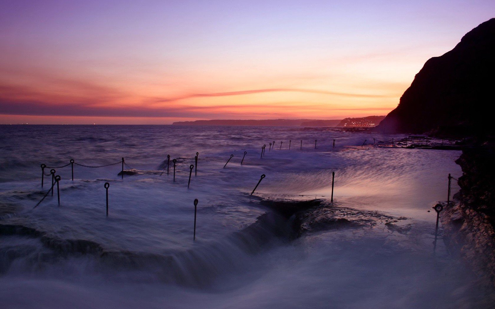 noche mar olas ganchos