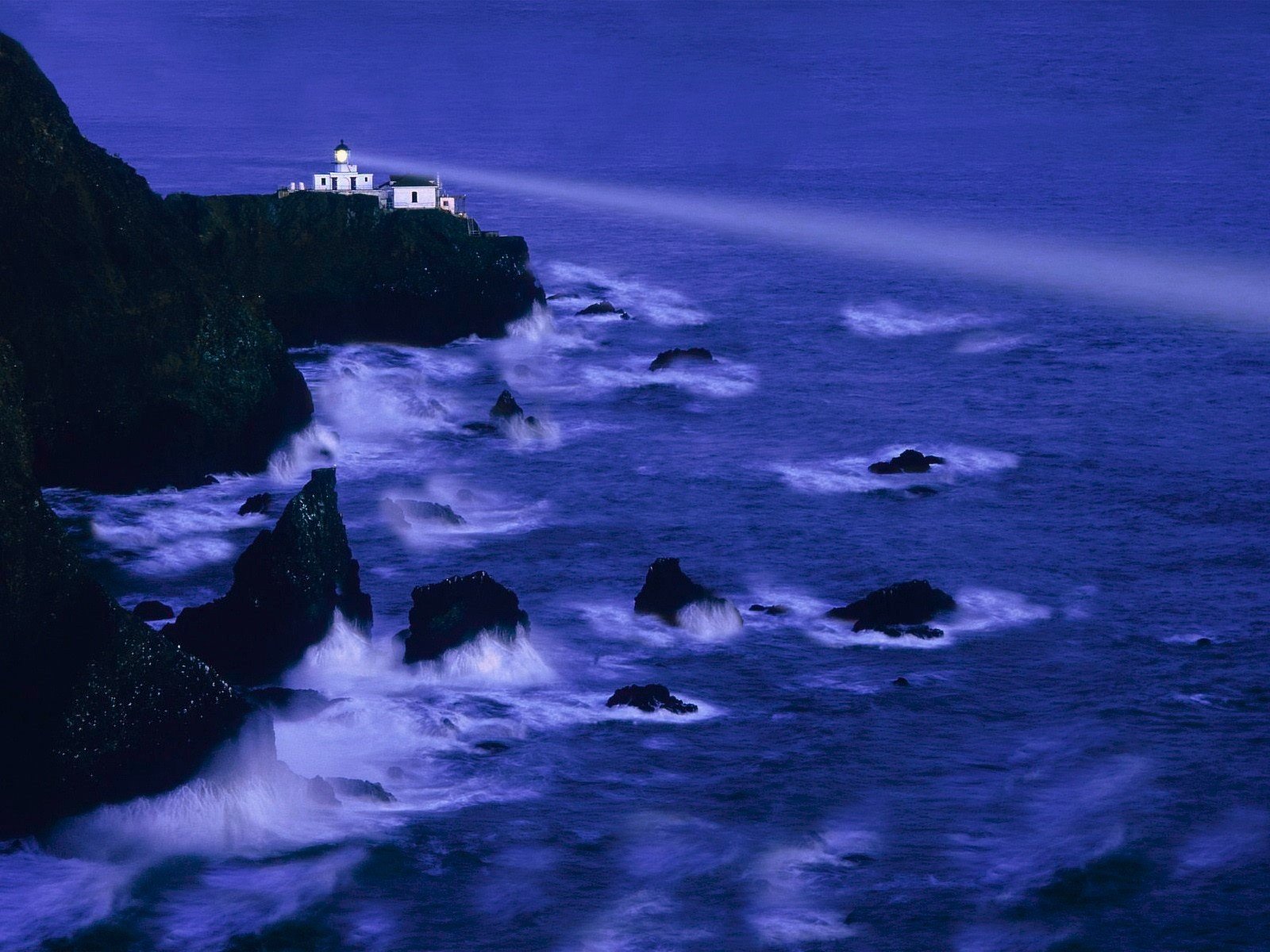 rock waves lighthouse