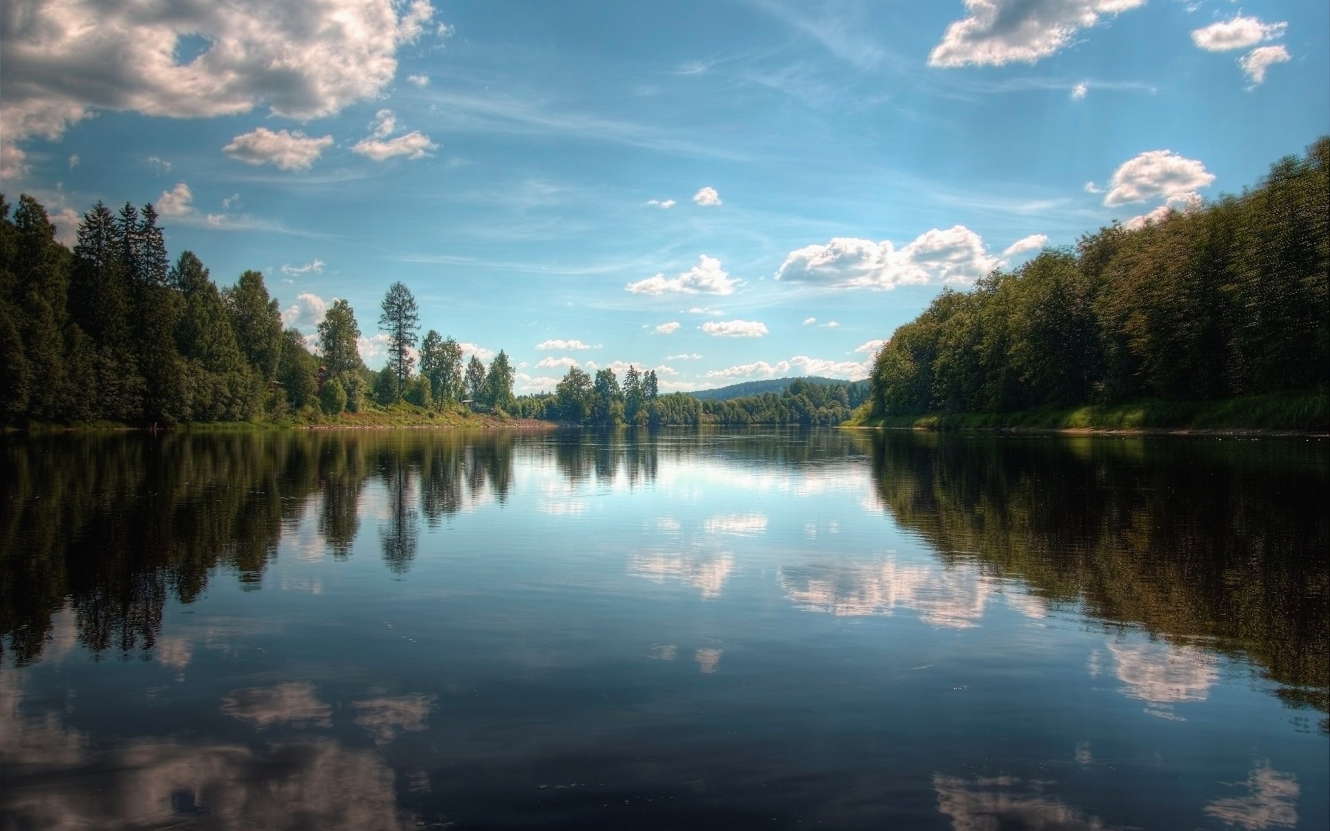 lago árboles reflexión