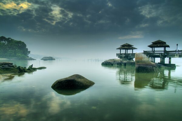 Rocky pier on the shore of the bay