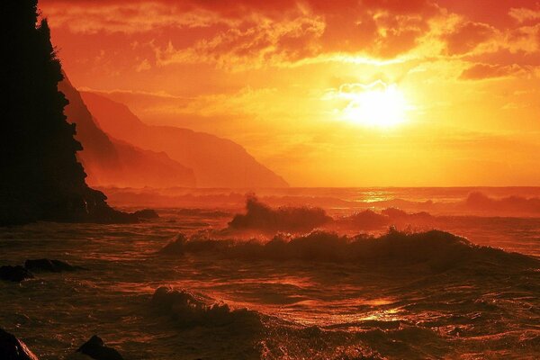 Fiery sunset over the raging sea