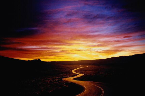 Suburban road at sunset