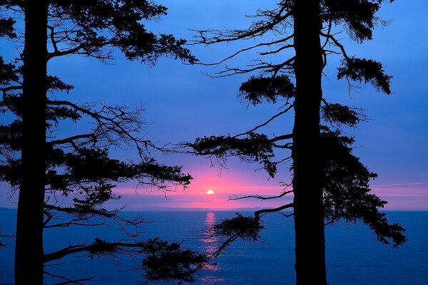 Sunset sky and a strip of light in the water