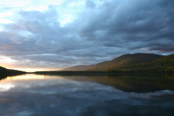 Clouds in the reflection of a lake in the mountains