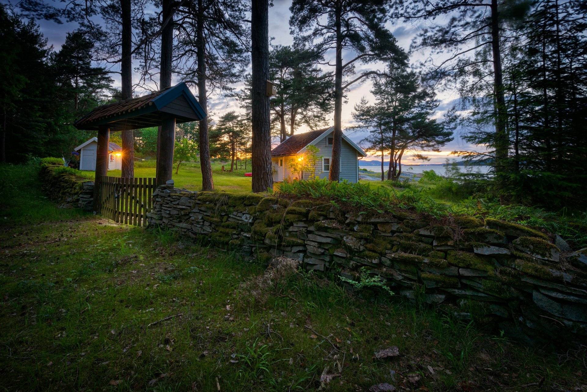 norway ostfold fence gate stones grass tree houses lamps lake