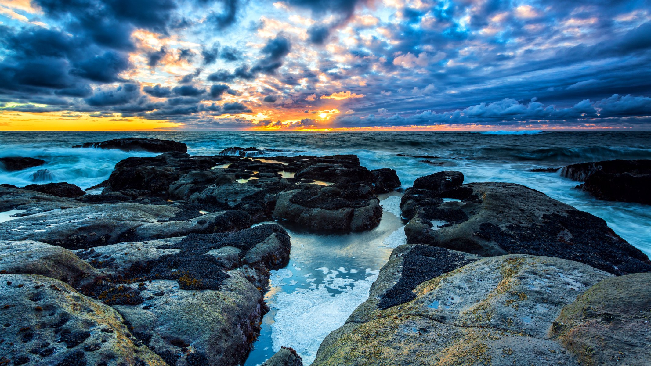 cielo nubes puesta de sol mar rocas rocas