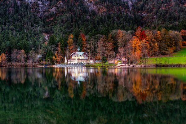 A Bavarian house on the shore of a boundless lake