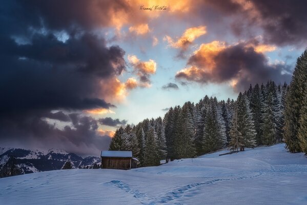 Winter holidays in an alpine house in the mountains