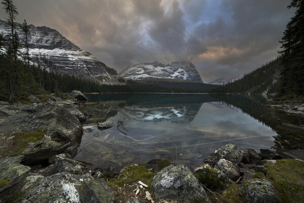 Dark landscape, lake in the mountains, mountains by the lake, nature in the mountains