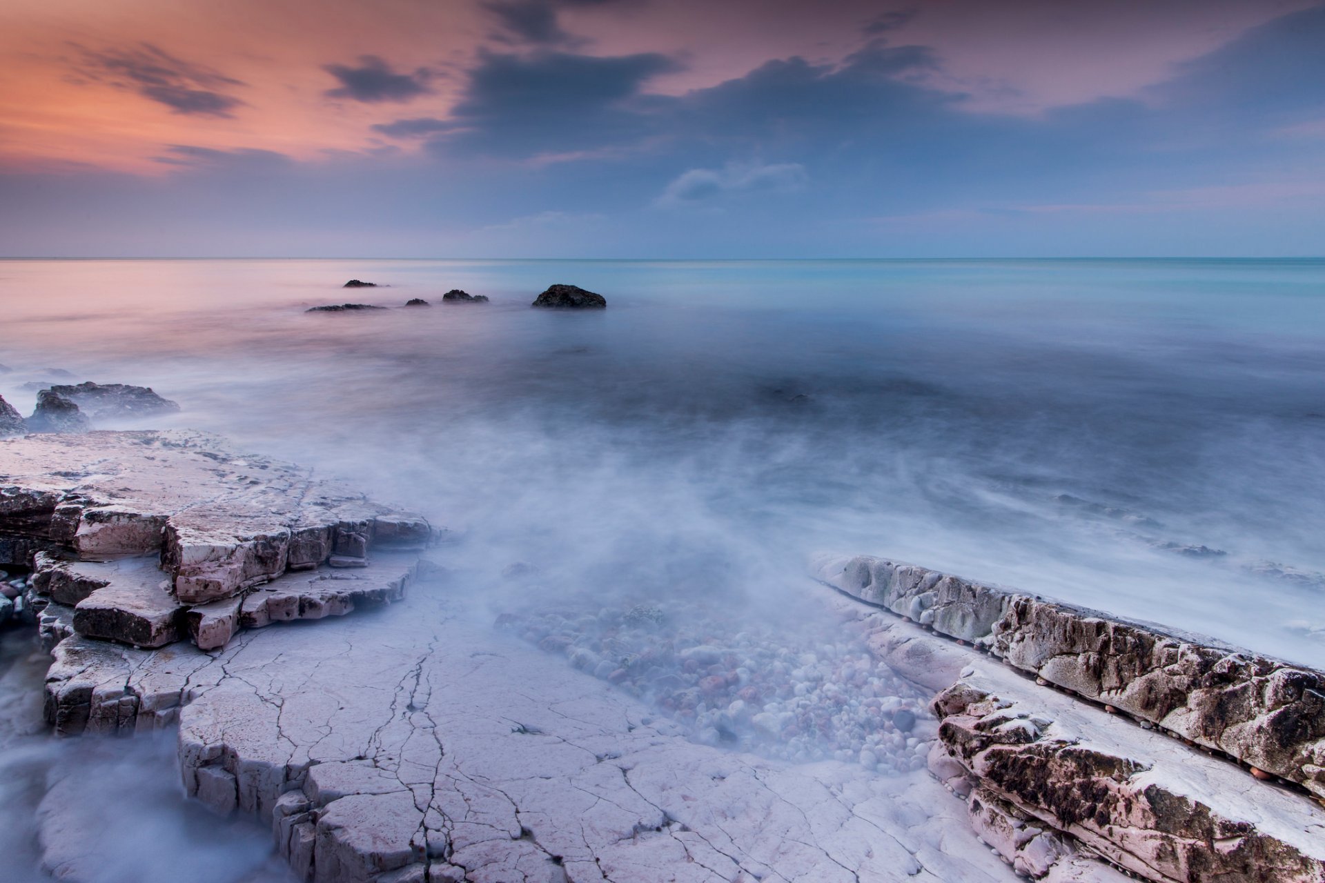 mare riva pietre cielo esposizione