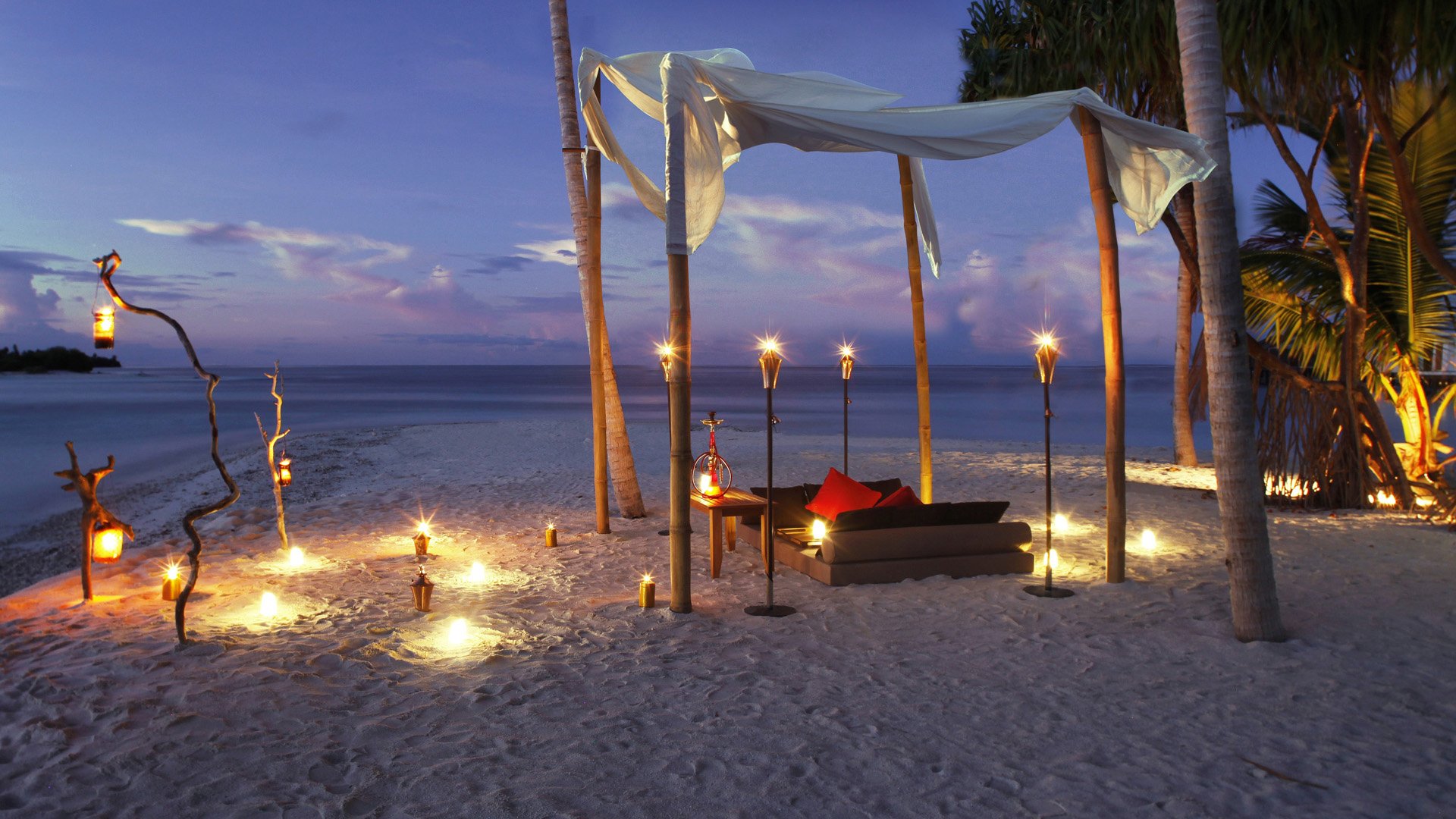 sera candele spiaggia oceano romanticismo