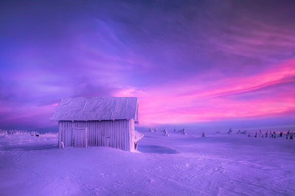 A lonely barn in snowy Norway