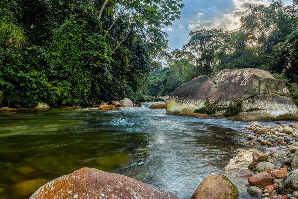 Transparent river on the background of mountains