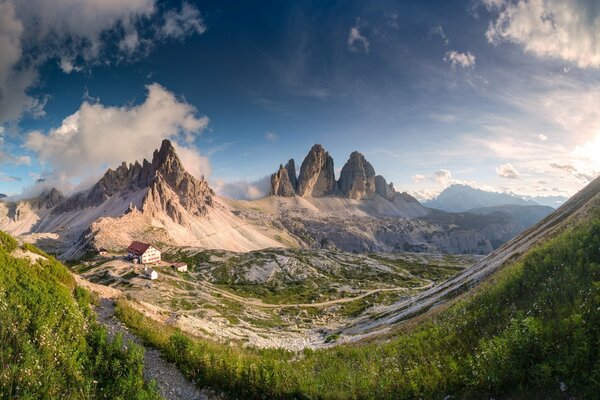 Panoramic view of the green valley against the background of the mountains