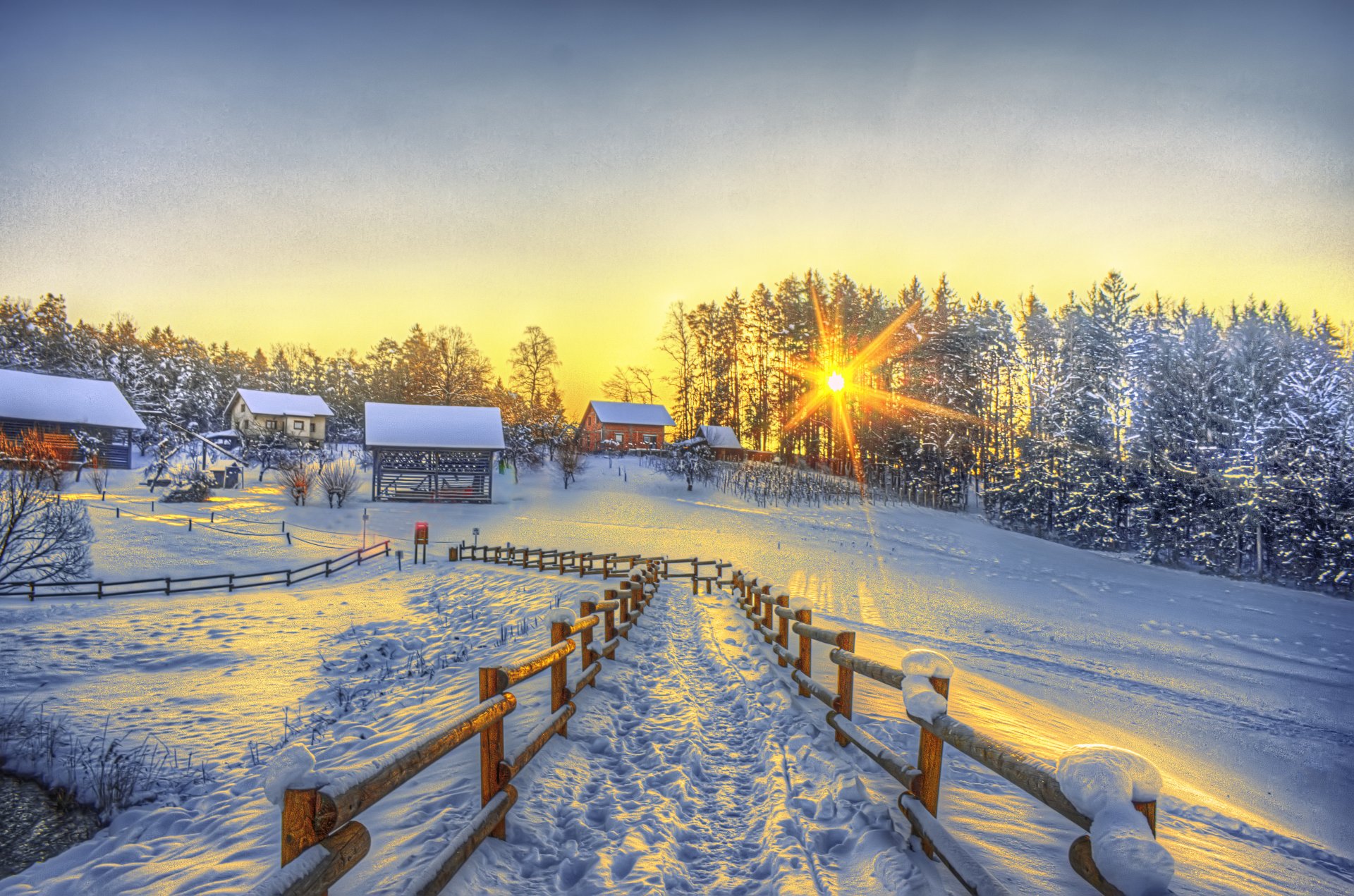 hdr winter winter snow trail fence sun houses village