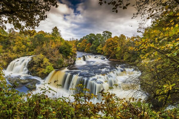 Waterfall in Scotland among the trees