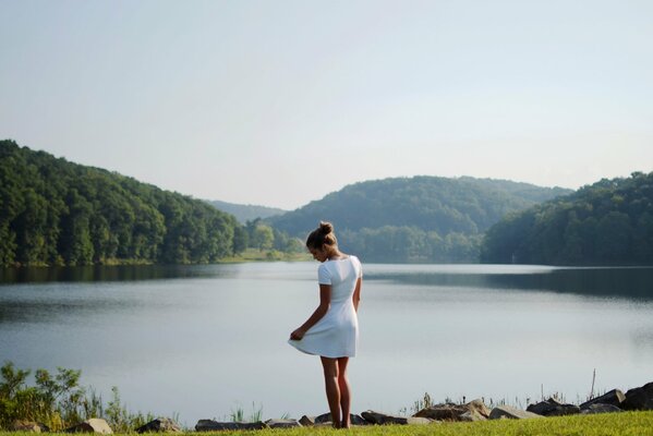 Girl on the lake shore