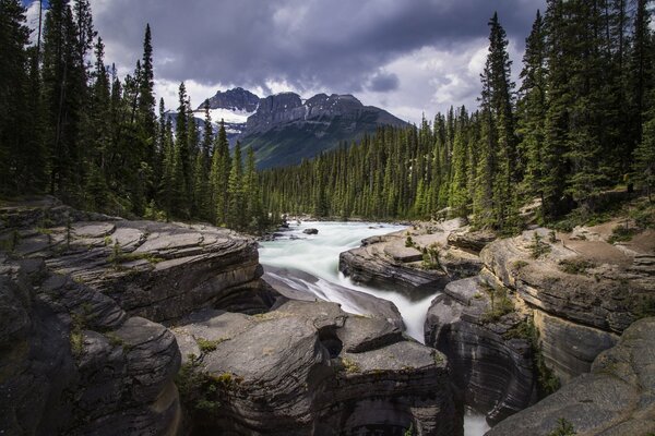 A stormy river beating against rocks