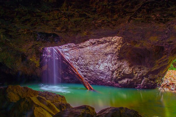 Emerald water in a stone grotto