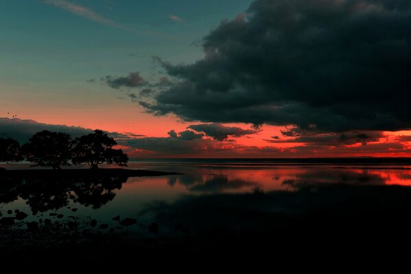 Sonnenaufgang am Nudgee Beach in Australien