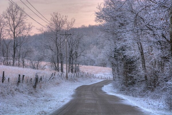 Winter morning road nature in frost