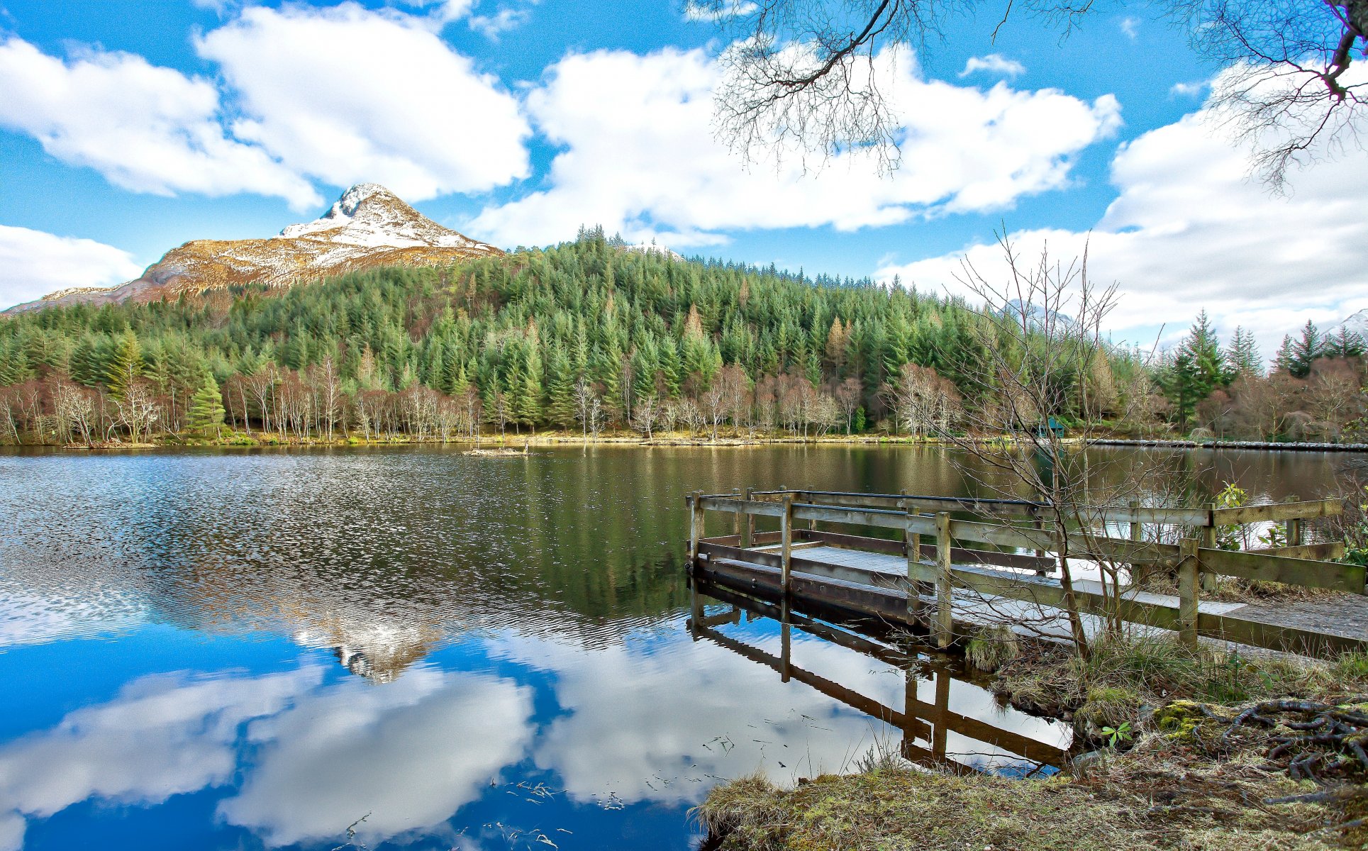 valley glencoe scotland river beach bridge mountain forest tree sky clouds reflection