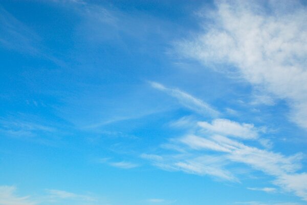 Endless blue sky with light clouds