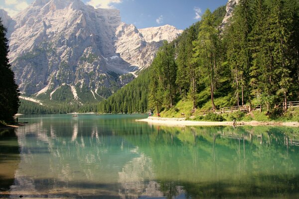 Reflection of the Alpine mountains in the lake