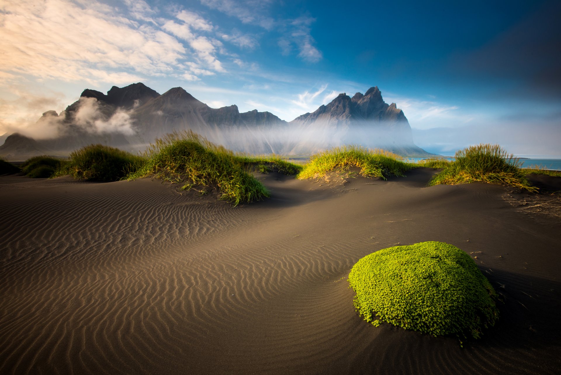 iceland mountain beach moss sand sea cloud