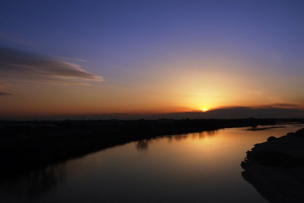 Dawn in the reflection of water