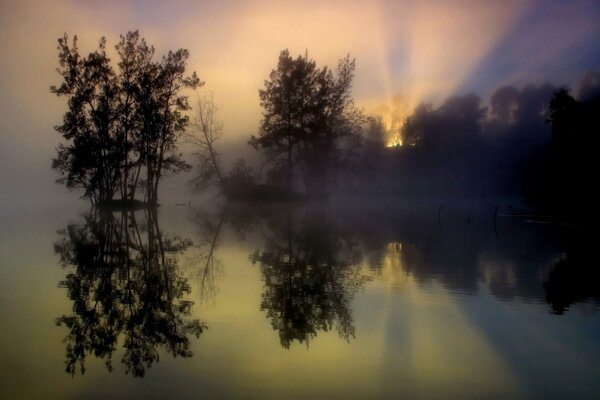 Reflection of sunrise on the lake